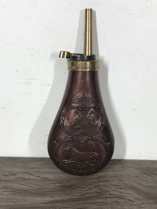 lot 84 image: Remington Powder Flask