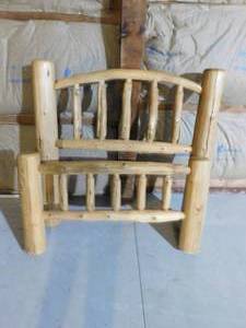 lot 168 image: Twin log headboard and end board
