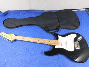 lot 200 image: Behringer electric guitar with case
