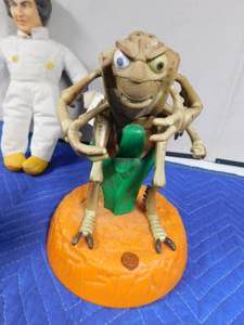 lot 206 image: battery operated Bugs Life toy, Stooges doll, and handmade collector dolls