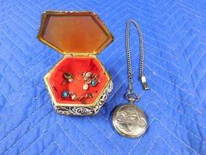 lot 211 image: Metal trinket box of earrings and a pocket watch