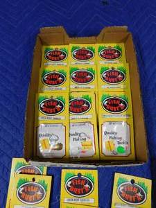 lot 253 image: Flat of new spinners in packages