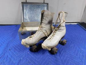 lot 261 image: Vintage roller skates in original metal case