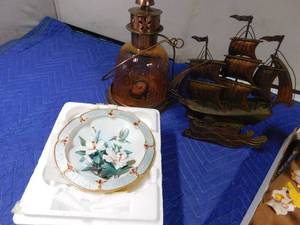 lot 263 image: Flat of Nic naks, wood coasters, candle lantern, collection plate, and more