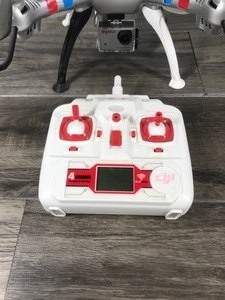 lot 406 image: Syma X8G Headless 2.4Ghz 4CH RC Quadcopter with 8MP HD Camera (Silver)