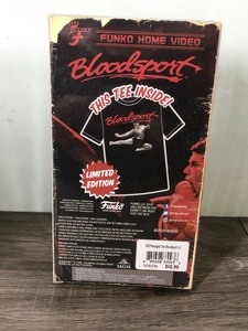 lot 437 image: Collectible Bloodsport T-Shirt Funko Home Video VHS Boxed Exclusive Black (VHS not included)