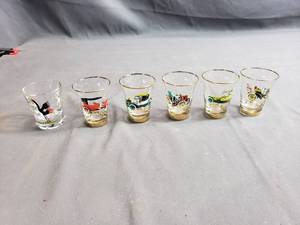 Shot Glasses with Decorations on them
