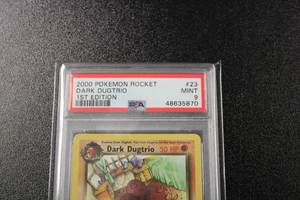 lot 20 image: 2000 Pokemon Team Rocket 1st Edition Dark Dugtrio #2382 PSA 9