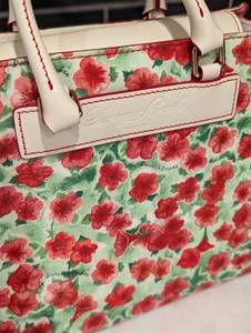 lot 9 image: Dooney and Bourke Floral Handbag