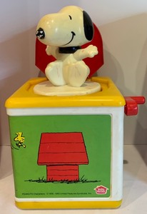 lot 114 image: Cute Vintage Snoopy Peanuts Collection - Jack In The Box and Department 56  Sharing Christmas Spirit