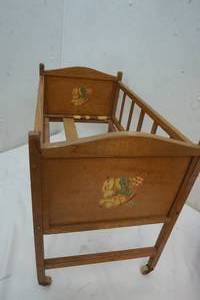 lot 118 image: Vintage doll bed
