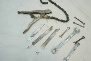 lot 135 image: Wrenches and chain