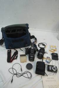 lot 160 image: Cannon EOS 35mm camera and case with Nikon camera