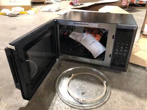 lot 16 image: Toshiba 1.0 cu. ft. in Stainless Steel 1000 Watt Countertop Microwave Oven with Air Fryer, Broil, Convection, Eco Mode   Customer Returns See Pictures
