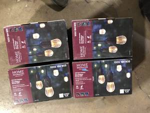 lot 25 image: Lot of 4 Home Decorators Collection 12-Light 24 ft. IndoorOutdoor Integrated LED String Light with Color Changing Bulbs Customer Returns See Pictures