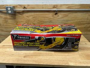 lot 48 image: Trimax TWL100 Ultra-Max Adjustable Wheel Lock, YellowBlack