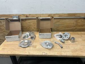 lot 78 image: DELTA Foundations 1-Handle Shower Only Faucet Trim Kit in Stainless (Valve Not Included) with Trinsic 1-Handle Wall Mount Shower Faucet Trim Kit in Chrome with H2Okinetic (Valve Not Included)