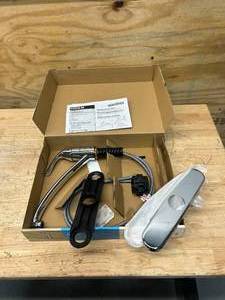 lot 92 image: MOEN Adler Single-Handle Low Arc Kitchen Faucet in Chrome with Tool Free Install
