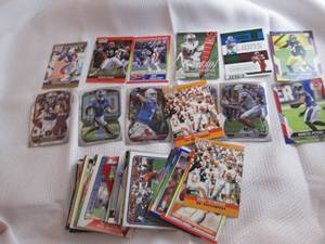 65 Assorted Football Cards...