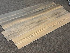 lot 707 image: Lot of (15 Boxes) Click-Snap Floating 100% Waterproof Luxury Plank Flooring by United Surface Solutions 28.84-sq.ft.  Total Coverage 432.60-sq.ft.