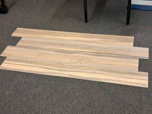 lot 713 image: Lot of (18 Boxes) Click-Snap Floating 100% Waterproof Luxury Plank Flooring by United Surface Solutions 28.84-sq.ft.  Total Coverage 519.12-sq.ft.