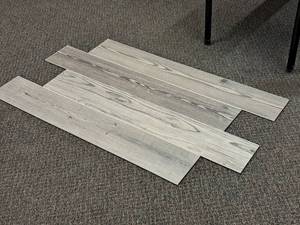 lot 719 image: Lot of (17 Boxes) Click-Snap Floating 100% Waterproof Luxury Plank Flooring by United Surface Solutions 28.20-sq.ft.  Total Coverage 479.4-sq.ft.