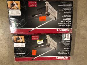 lot 8 image: Lot of 2 ROBERTS 13 in. Multi-Floor Cutter with 0 to 45 Degree Miter Guide and 28-12 in. Handle Customer Returns See Pictures