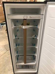 lot 18 image: Vissani 7 cu. ft. Convertible Upright FreezerRefrigerator in Stainless Steel Garage Ready  has scratches and dent  Customer Returns See Pictures