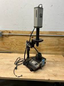lot 21 image: HITACHI CCTV Camera Model HV-720U mounted on MICRO SLIDES Model A-6060