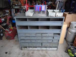 lot 108 image: Equip Co metal hardware bin system. Very nice. Lots of bins. Heavy duty Approx 40 x 44. As shown.