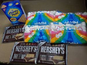 lot 149 image: 1 Box Honey Maid Graham Crackers, 4 bags Jet Puffed Marshmallows and 3 - 6 packs Full Size Candy Bars