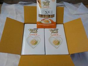 lot 173 image: 30 ct Purina Fancy Feast Savory Cat Treats Natural Salmon and Tuna in a Demi Glaze best date 082023 Retail $90 total