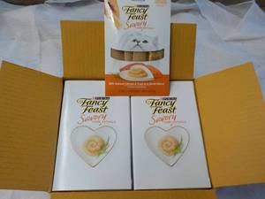 lot 175 image: 30 ct Purina Fancy Feast Savory Cat Treats Natural Salmon and Tuna in a Demi Glaze best date 082023 Retail $90 total