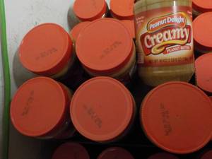 lot 228 image: 6 x 40 oz Peanut Delight Peanut Butter past best date