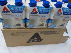 lot 332 image: 12 x 11 oz Atkins Creamy Vanilla Shakes best date 112023