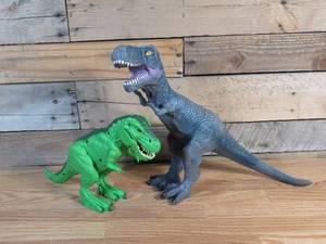 lot 24 image: Pair of T-Rex Toys