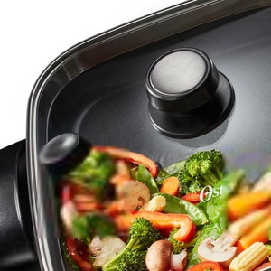 lot 74 image: Oster DiamondForce Strain & Pour Electric Skillet , 12 Inch x 12 Inch
