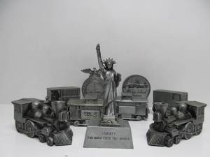 lot 35 image: Large Group of Vintage Aluminum Coin Banks