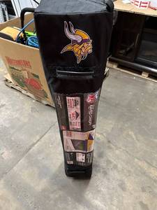 lot 62 image: New 12 x 12 Rawlings NFL Minnesota Vikings Stadium Series Eaved Canopy and Shade Wall - Tailgating Gear