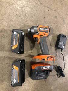 lot 32 image: Ridigd Power Tool withy Batteries and Charger Customer Returns See Pictures
