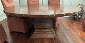 lot 8 image: Modern Round Pedestal Dining Room Table with 7 Upholstered Chairs