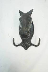 lot 2 image: Cast iron coat hook