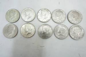 lot 232 image: Kennedy Half dollars