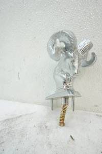 lot 410 image: Dodge Ram hood ornament
