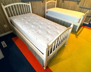 lot 31 image: Pair of Wooden White Twin Trundle Bed Frames