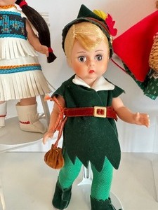 lot 219 image: (4) Madame Alexander Character Dolls including Madame Alexander Peter Pan Doll
