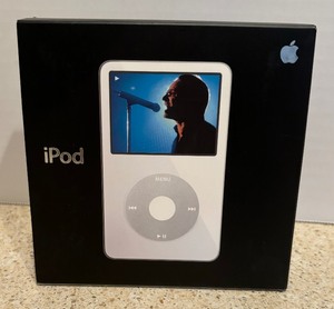 lot 251 image: Apple iPod, iPod Universal Dock and iPod AV Cable
