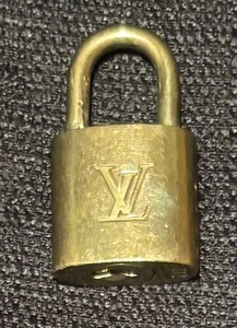 lot 325 image: Louis Vuitton Lock #312 with Two Keys