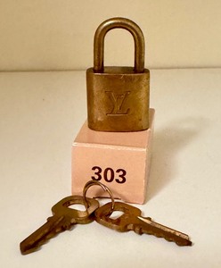 lot 293 image: Vintage Louis Vuitton #303 Padlock and Key