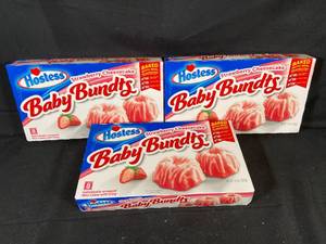 lot 303 image: Hostess Strawberry Cheesecake Baby Bundts 10oz - 3-Pack Best by 11222023
